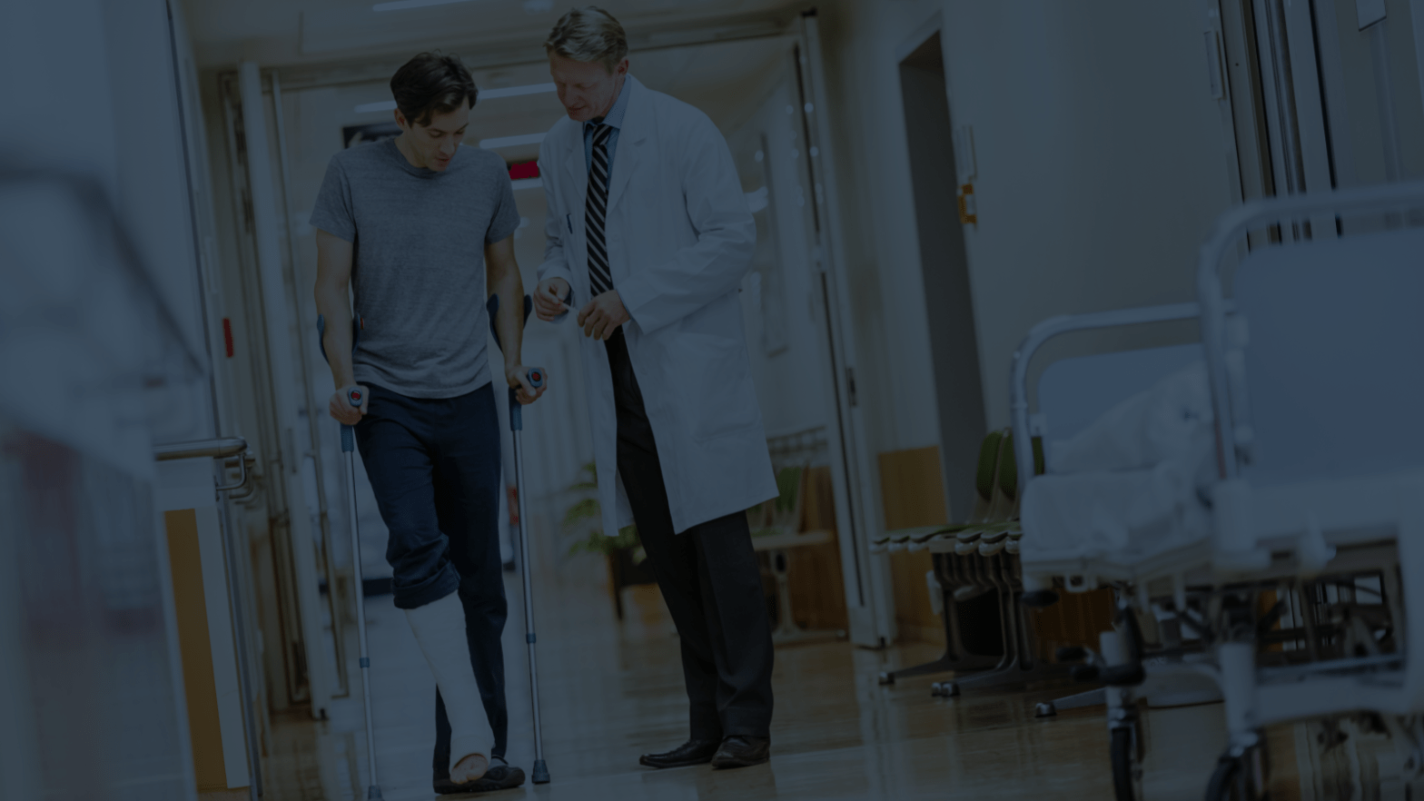 doctor helping patient recover from personal injury